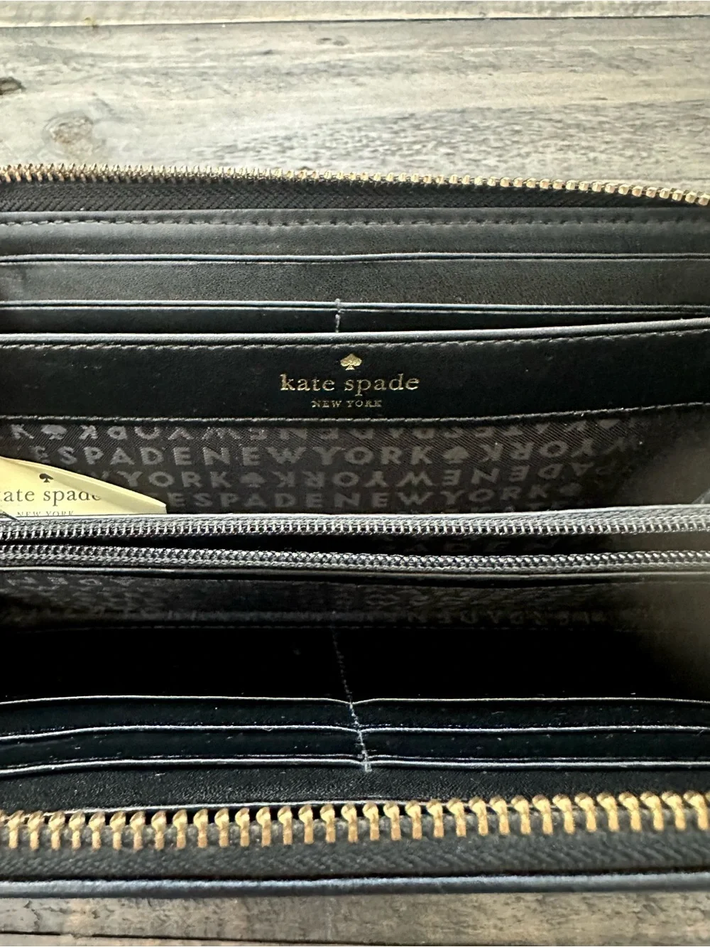 Kate Spade Black Pebbled Leather Tassel Zip Wallet with Gold Hardware
